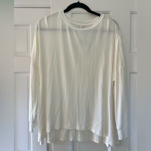 NWT long sleeve top. Thin soft material. Size small. Drop shoulder sleeves.
